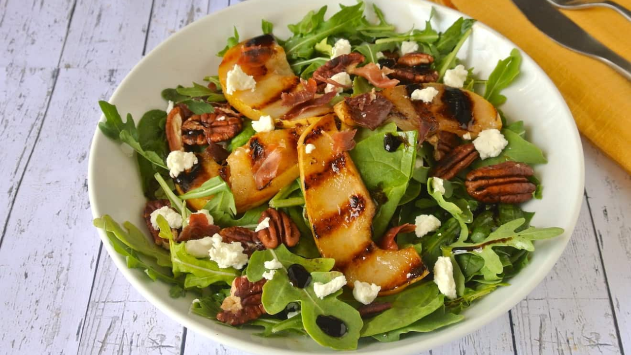 4. Frisée Pear and Prosciutto Salad